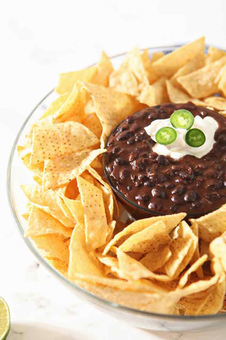 black bean dip surrounded by tortilla chips