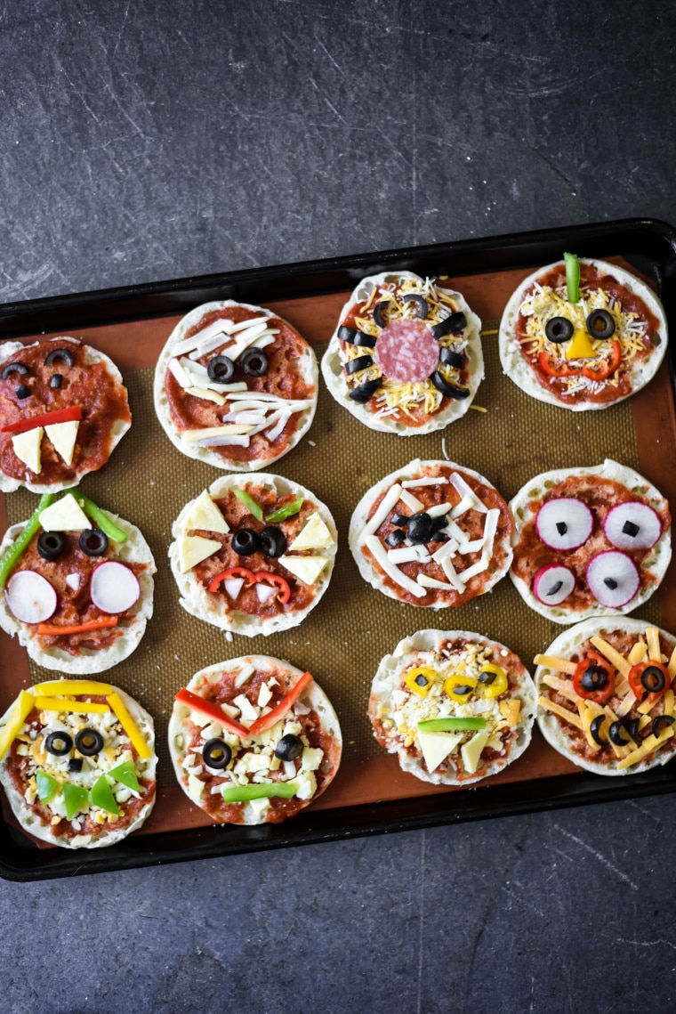 baking tray with halloween pizzas