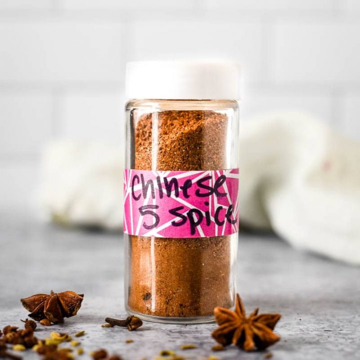 glass bottle with homemade chinese five spice powder inside