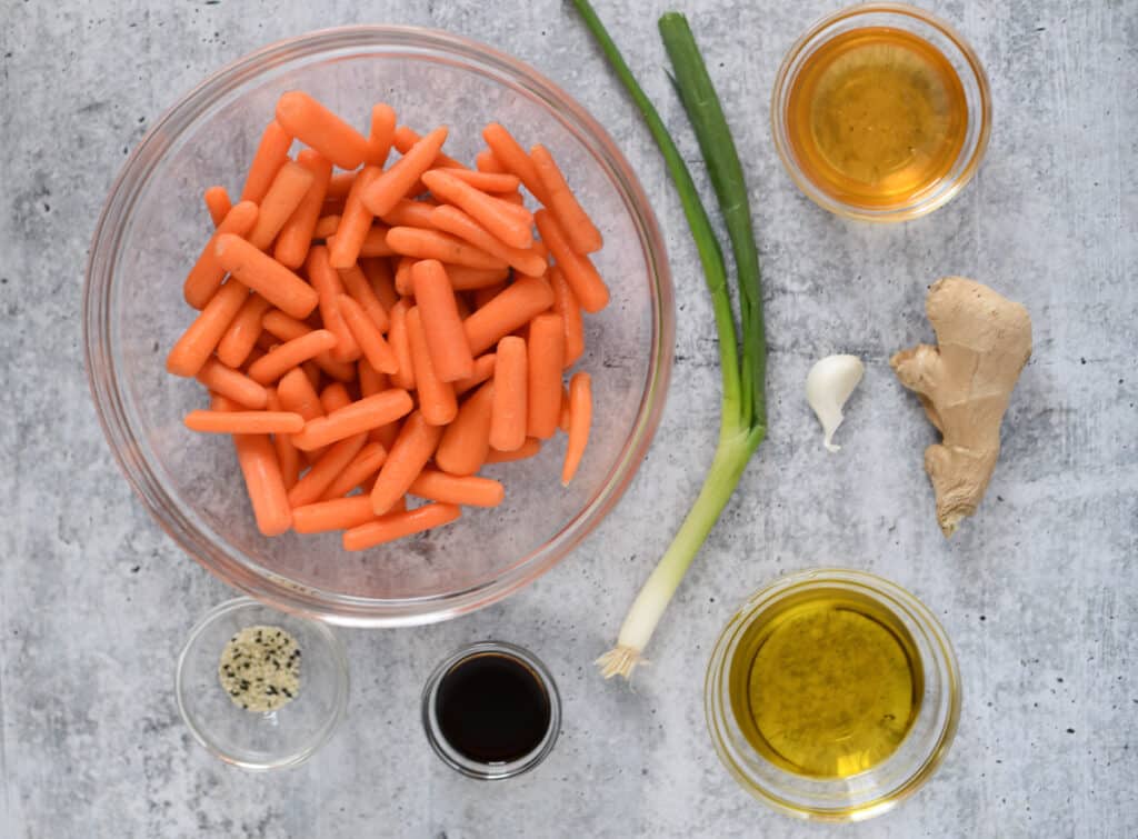 ingredients for honey ginger baby carrots on counter