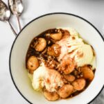 easy bananas foster in bowl with spoons