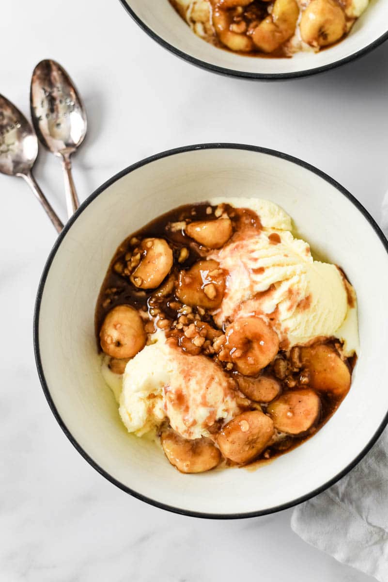 easy bananas foster in bowl with spoons