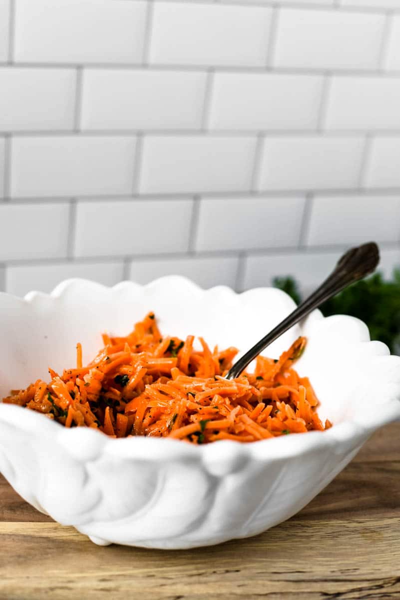 french carrots in white bowl