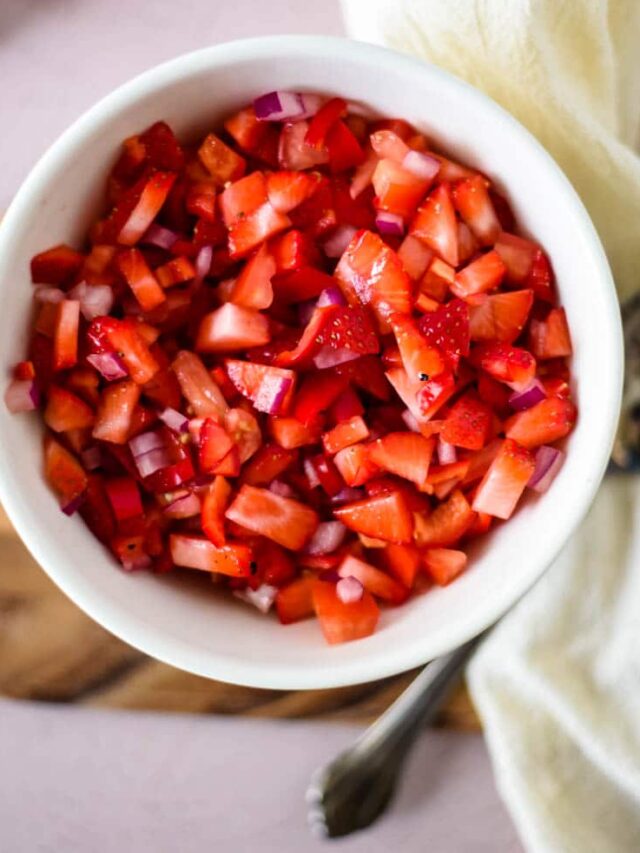 overhead of strawberry salsa in white bowl