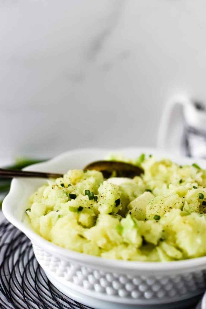 white bowl with irish mashed potatoes with cabbage