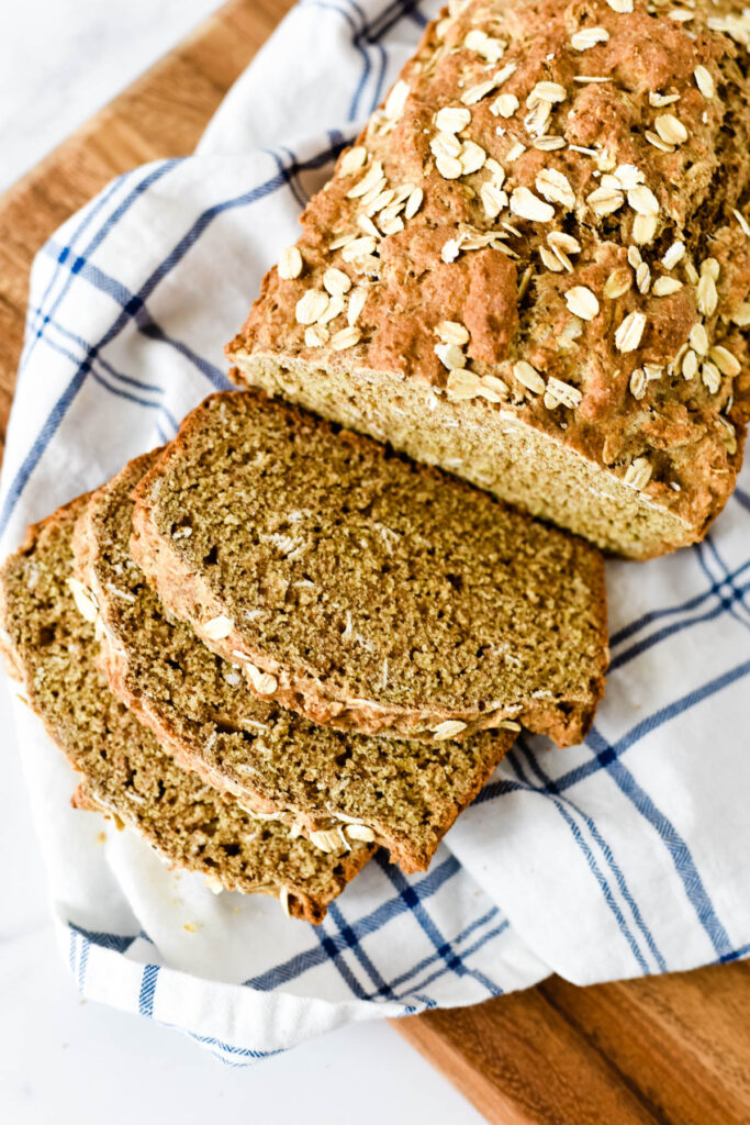 wheaten bread on cutting board with slices