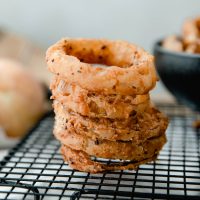 stack of onion rings on wire rack