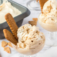 two glass dishes with ice cream and cookies