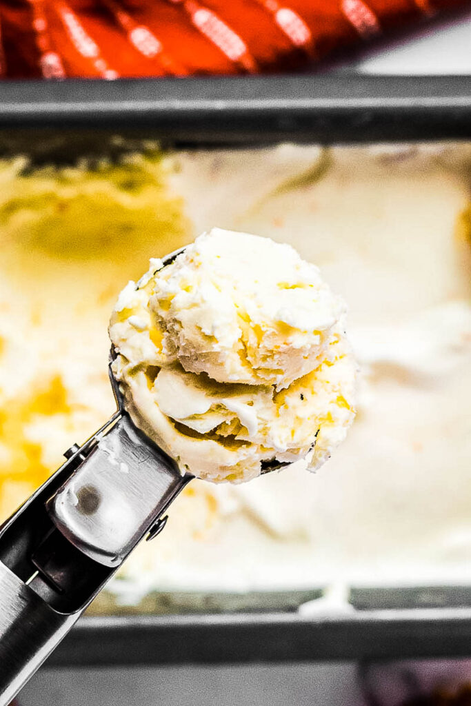 ice cream scoop with orange ice cream