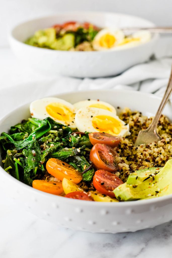 breakfast quinoa bowl with veggies and eggs