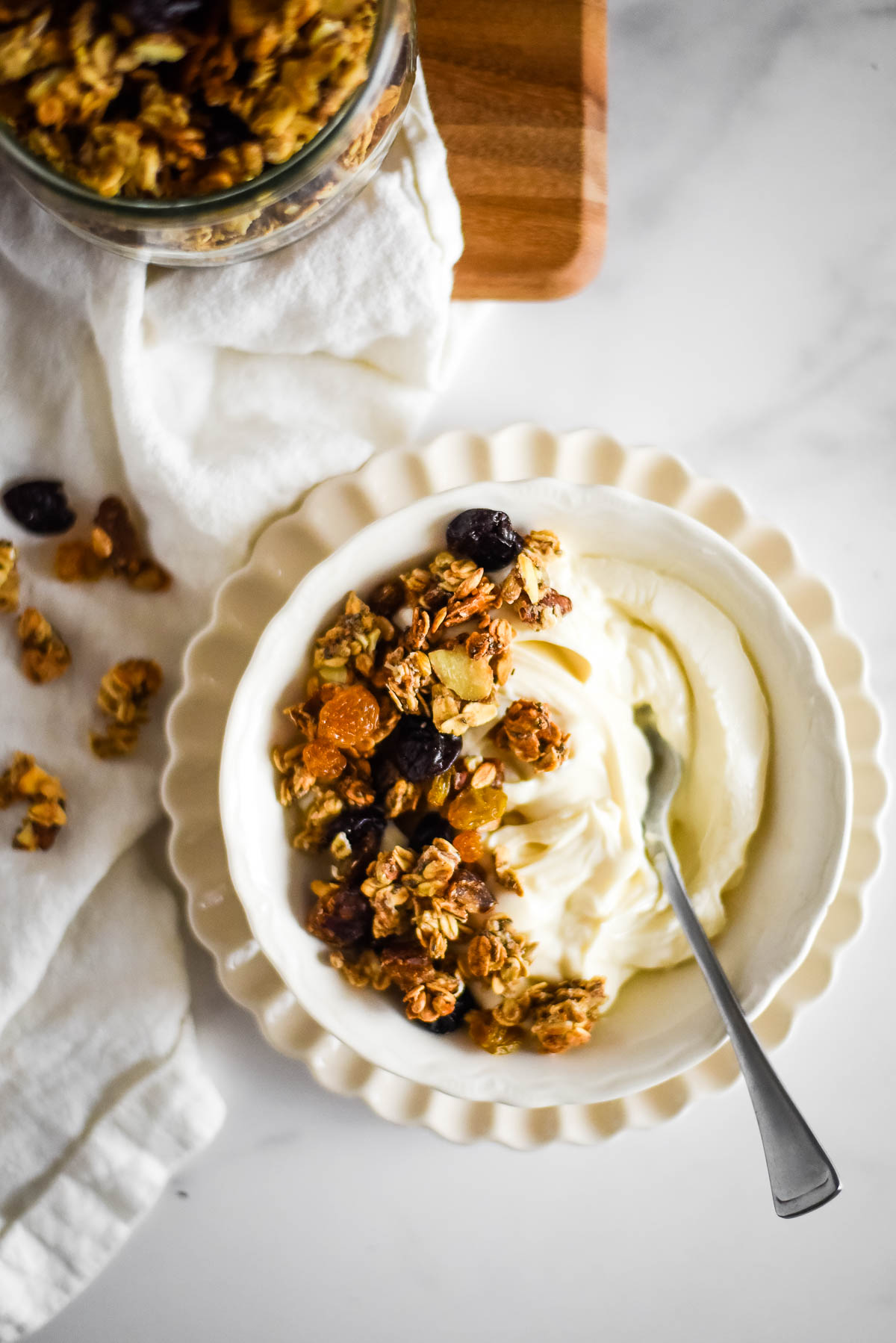 yogurt in bowl with granola on top