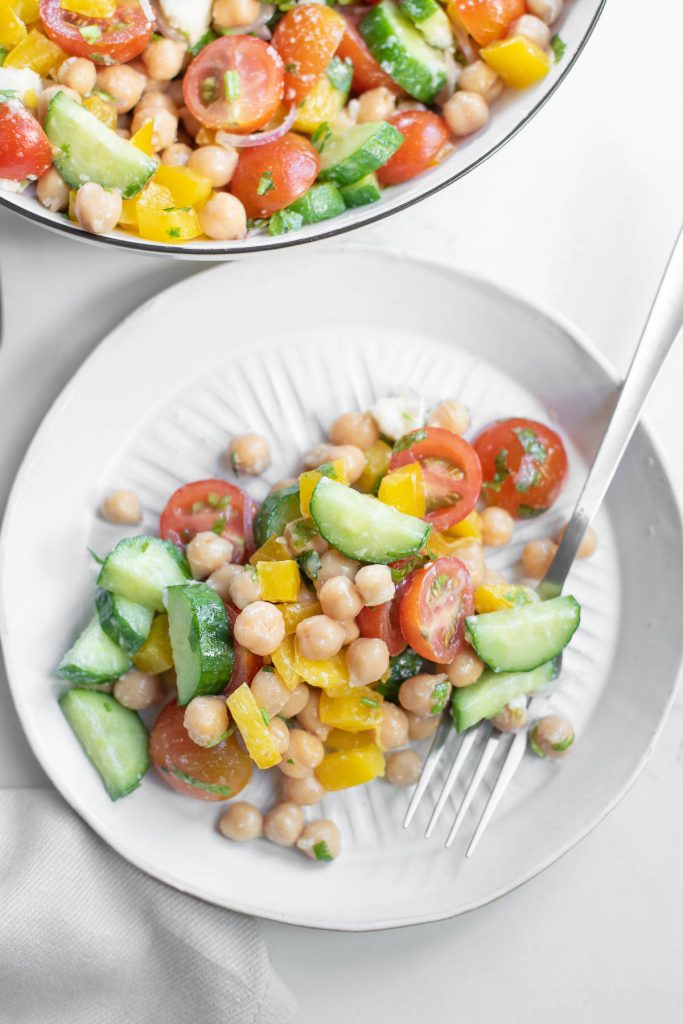 plate with chickpea salad and fork