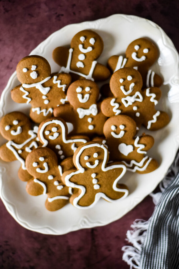 white platter piled with sourdough gingerbread men