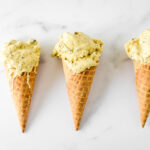 three ice cream cones in a row