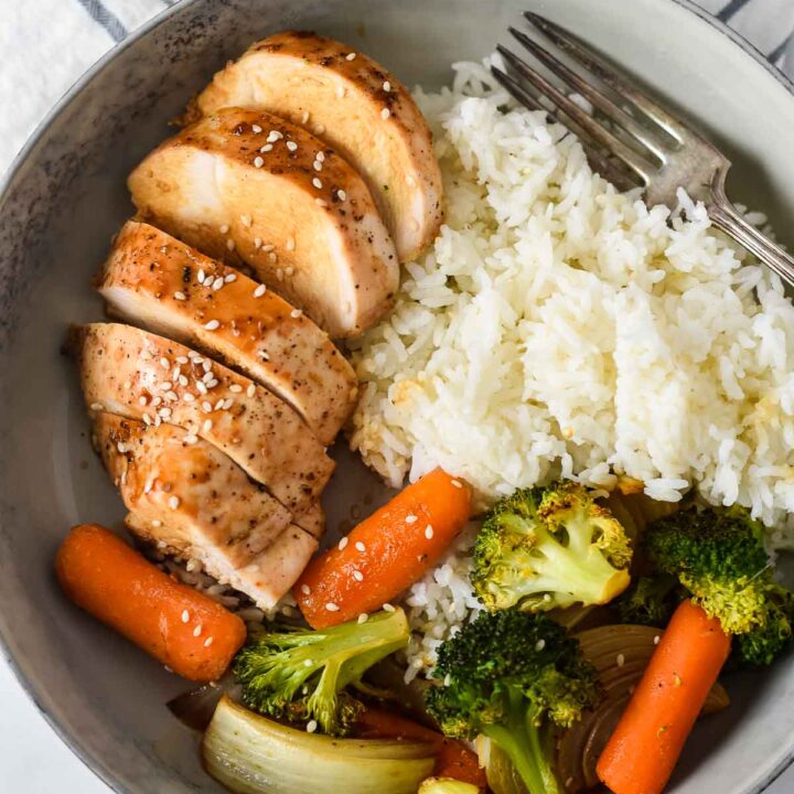 grey bowl with chicken teriyaki, rice and roasted vegetables
