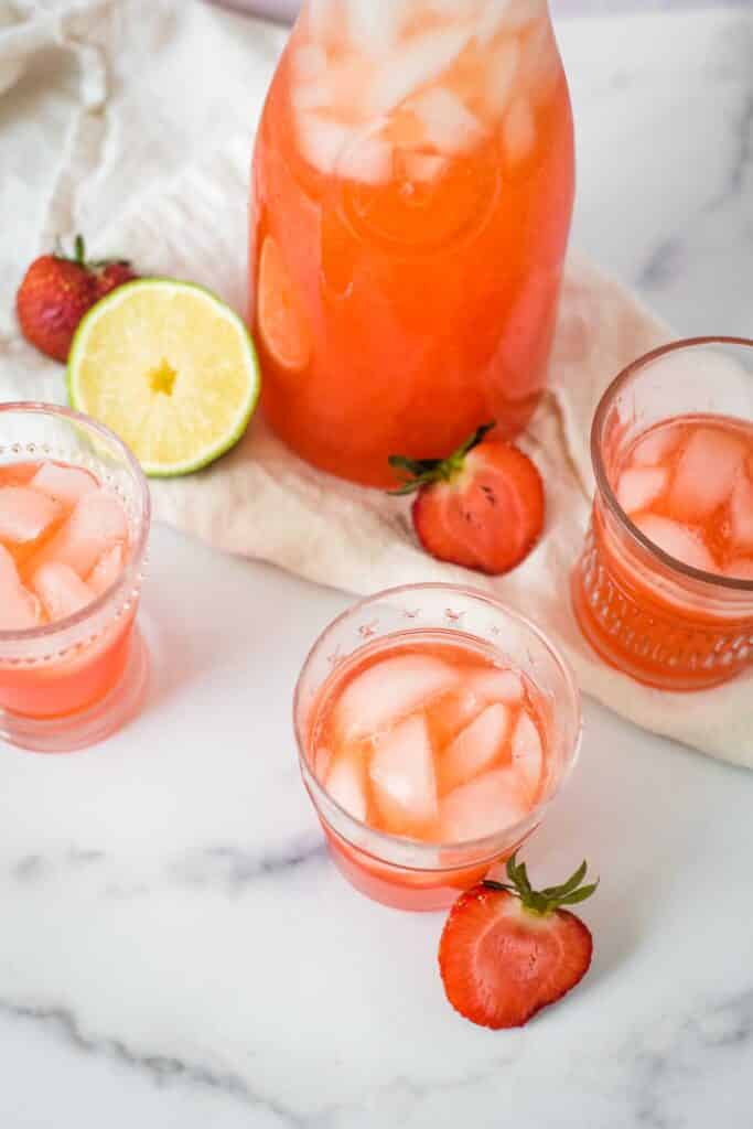 overhead view of strawberry limeade in glasses