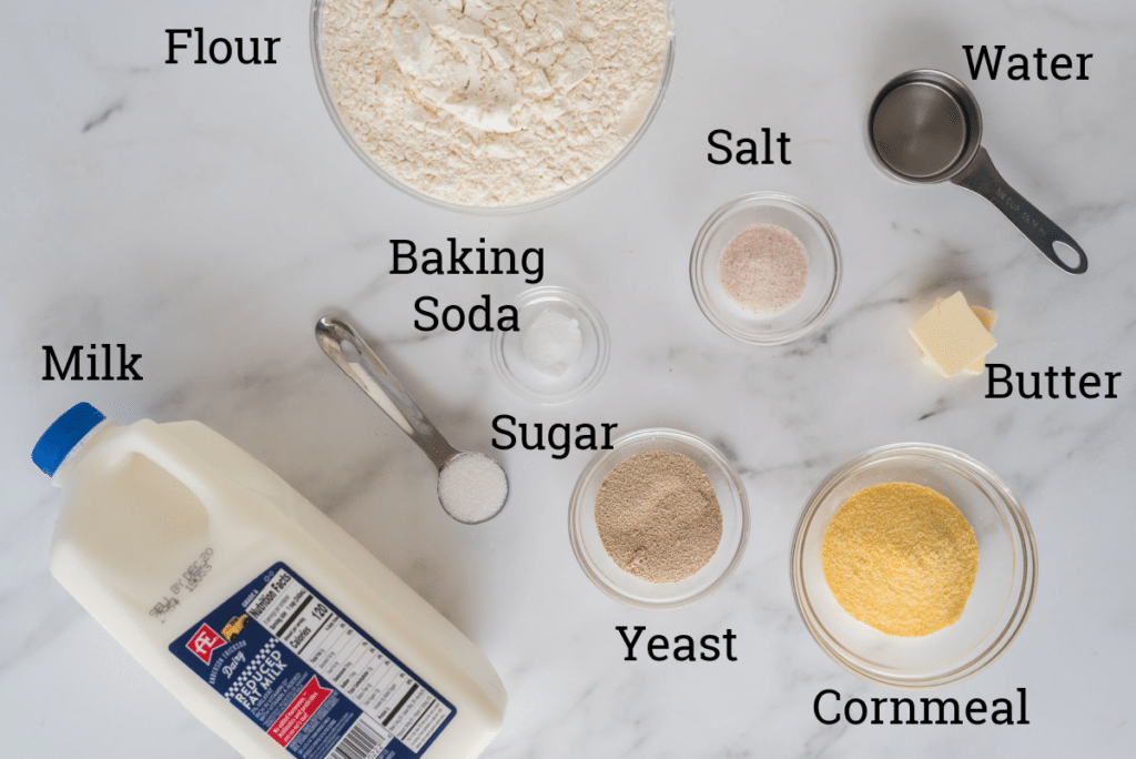 ingredients for english muffin bread with text overlay labels