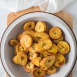 white bowl filled with fried plantain slices