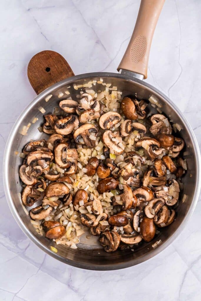 pan with sautéed onions and mushrooms