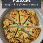 Korean pancake cut into wedges on a grey plate with text overlay for pinterest