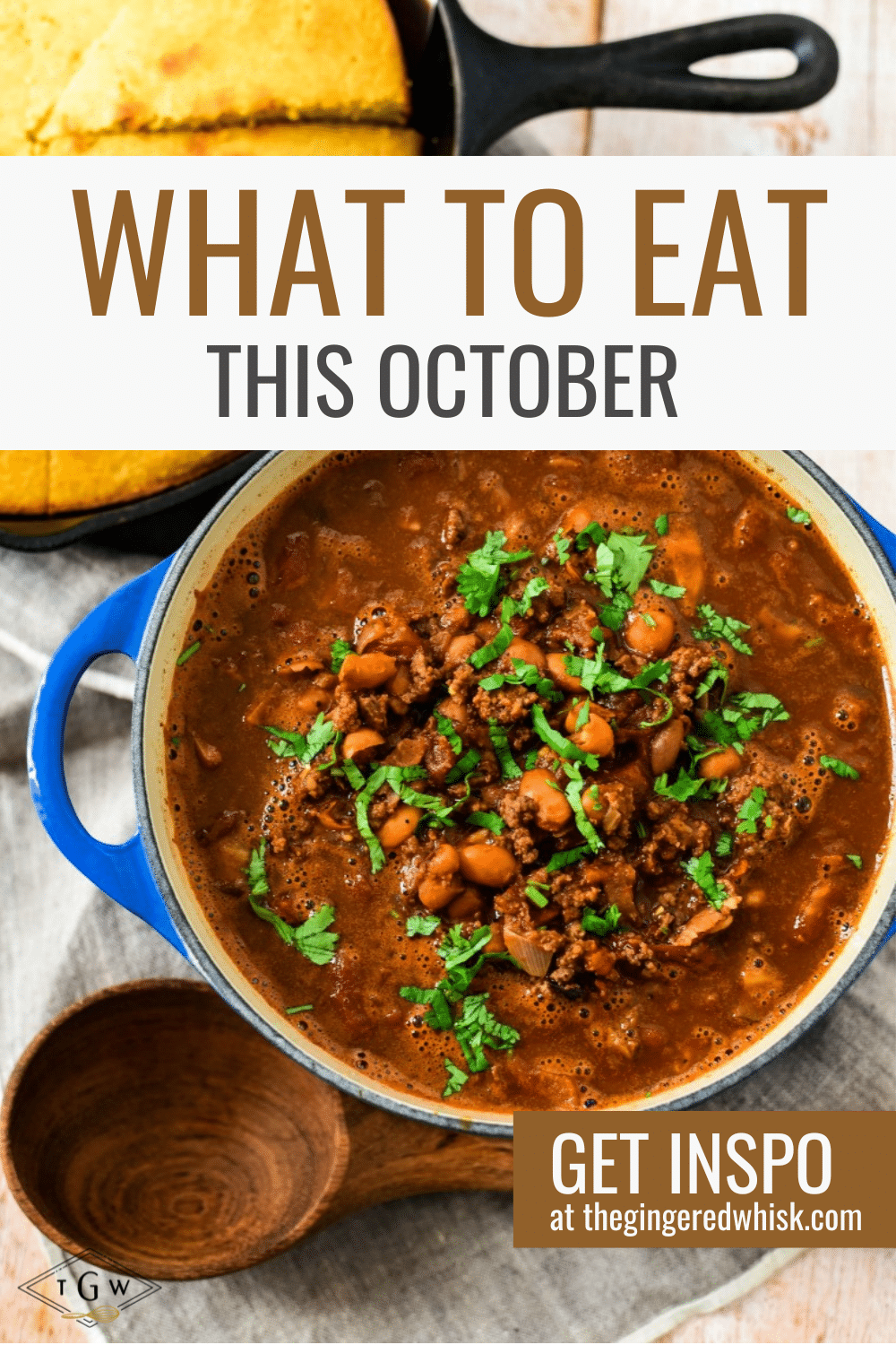 overhead view of pot of chili with wooden spoon and cornbread in corner and text overlay that reads "what to eat this october"