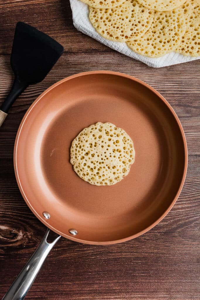 skillet with pancake cooking