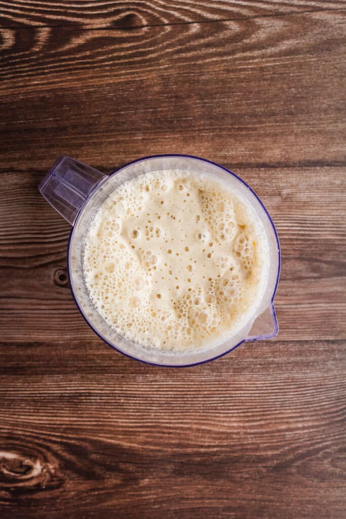 blender pitcher showing batter ready to make pancakes