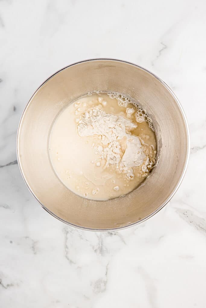 metal mixing bowl with ingredients for asian dumpling wrappers