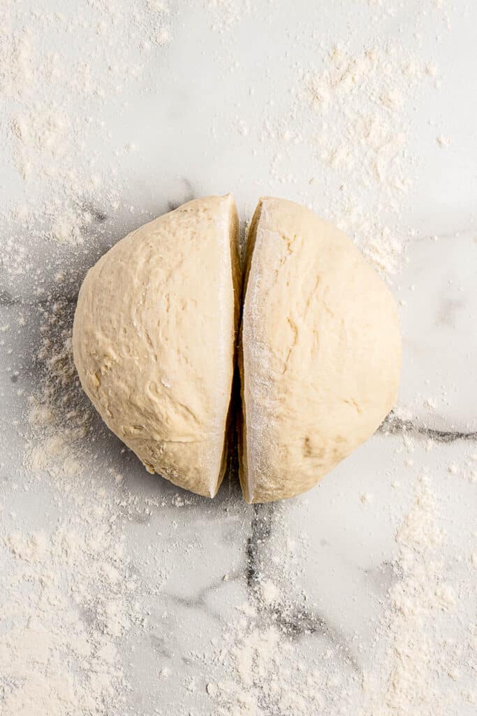 round dough cut into two equal pieces