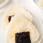 two onigiri on white plate